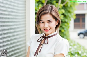 a woman in a yellow top and panties posing for a picture